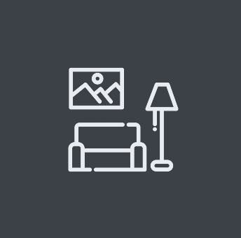A living room with a couch, lamp and picture on the wall.